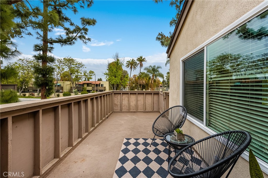 1420 E Cabrillo Park Drive, Unit E Santa Ana, CA 92701 - Photo 3 of 46 a view of balcony with furniture