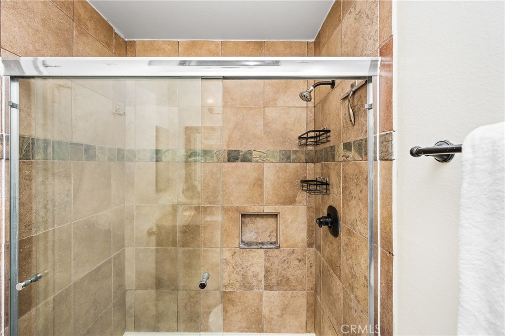 1420 E Cabrillo Park Drive, Unit E Santa Ana, CA 92701 - Photo 33 of 46 a bathroom with a shower