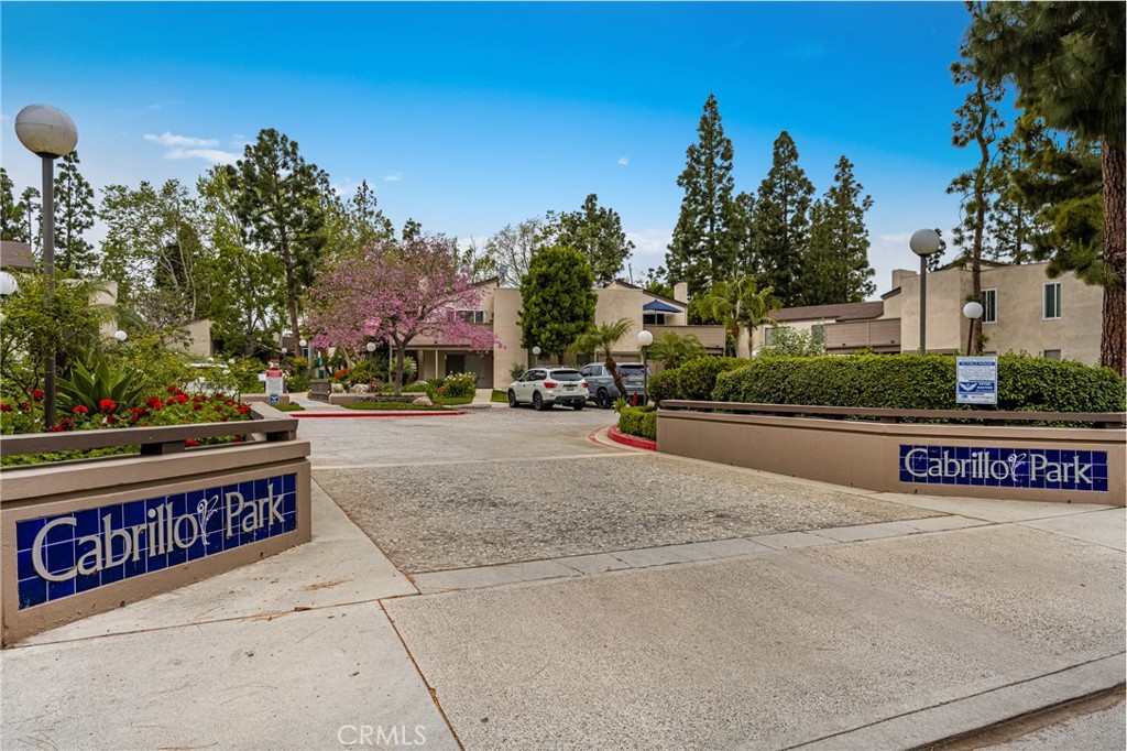 1420 E Cabrillo Park Drive, Unit E Santa Ana, CA 92701 - Photo 7 of 46 a street sign on a sidewalk next to a road