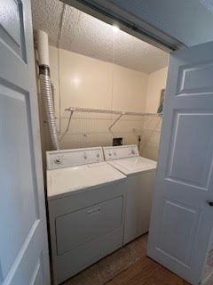 181 Littleton Road, Unit 236 Chelmsford, MA 01824 - Photo 7 of 14 a utility room with dryer and washer