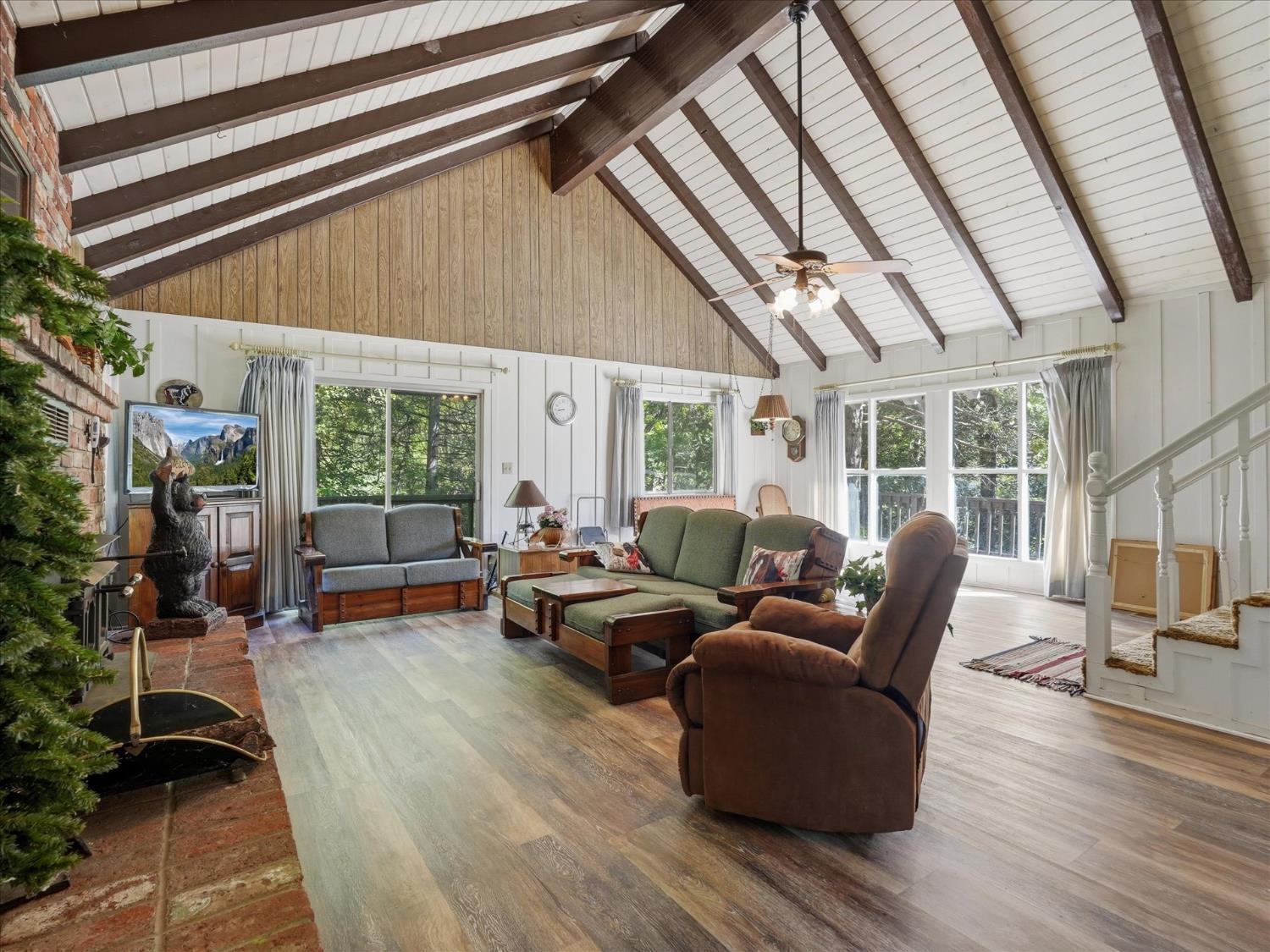 45167 Tolladay Road Oakhurst, CA 93644 - Photo 7 of 50 a living room with furniture and a large window
