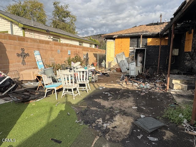 639 Mountain View Street Fillmore, CA 93015 - Photo 11 of 11 a view of a patio with table and chairs near a barbeque