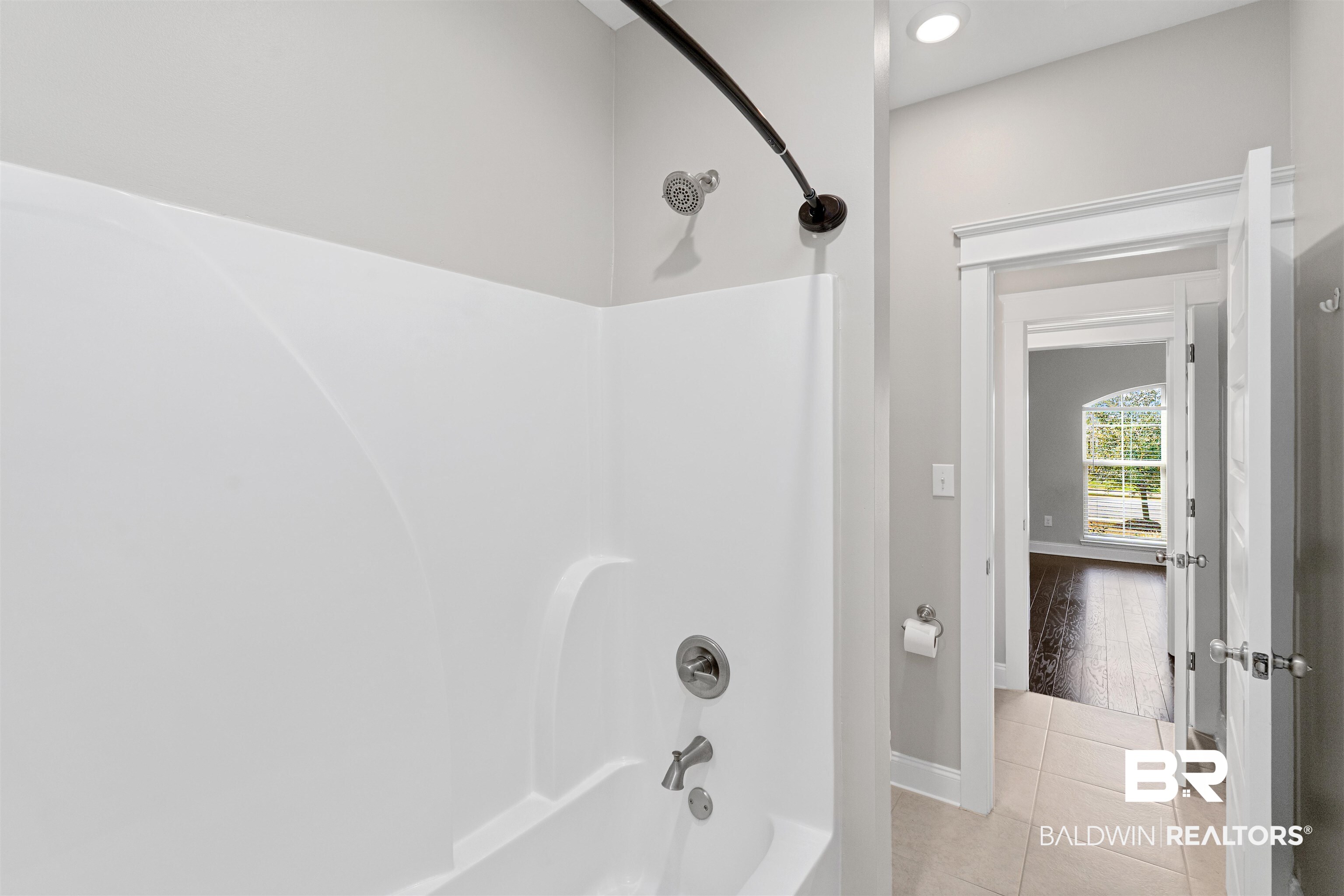 24838 Slater Mill Road Daphne, AL 36526 - Photo 26 of 46 Bathroom featuring shower / bath combination, light tile patterned floors, and recessed lighting
