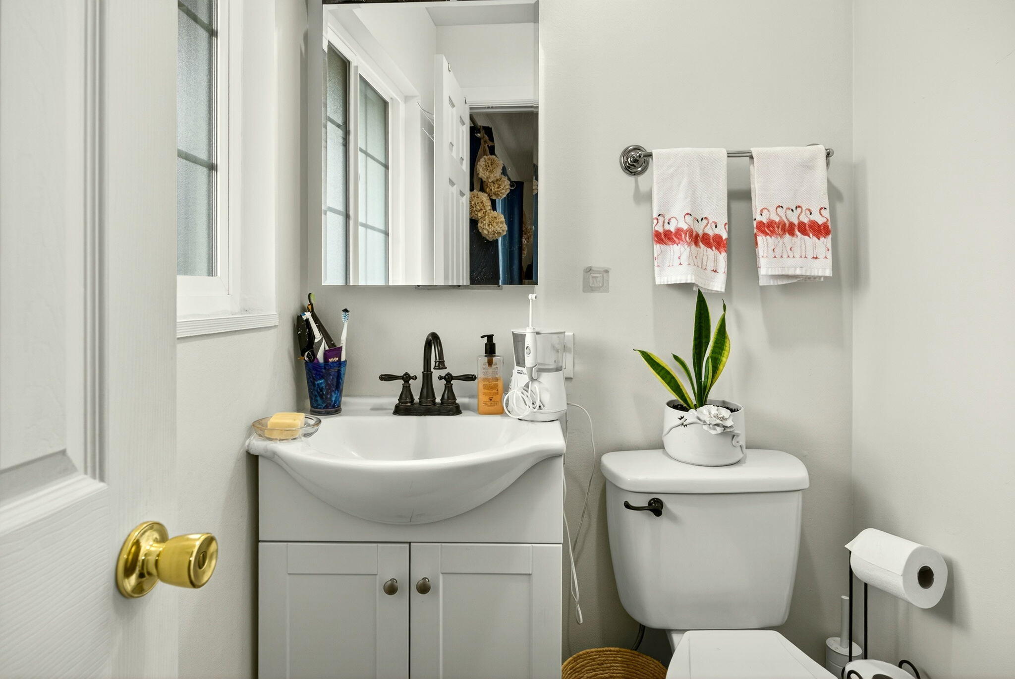 659 Herman Avenue Medford, OR 97501 - Photo 37 of 42 a bathroom with a sink a toilet and mirror