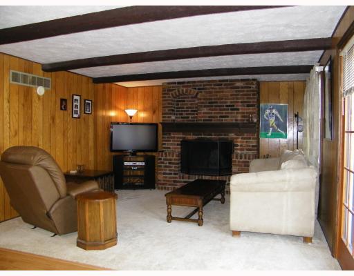 1981 Carriage Hill Road Allison Park, PA 15101 - Photo 6 of 18 Den/Family/Great Room. Family Room with beamed ceiling, brick fireplace, and atrium doors to rear composite deck with hot tub.