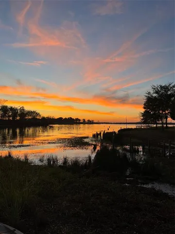 a view of lake with mountain