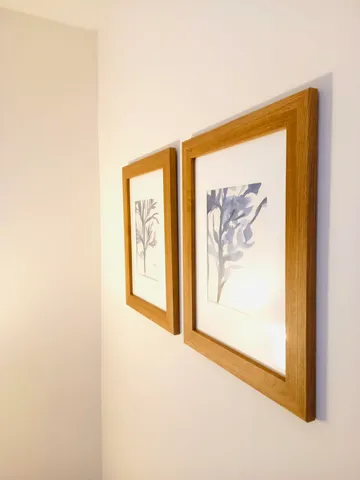 a room with a dresser and a window