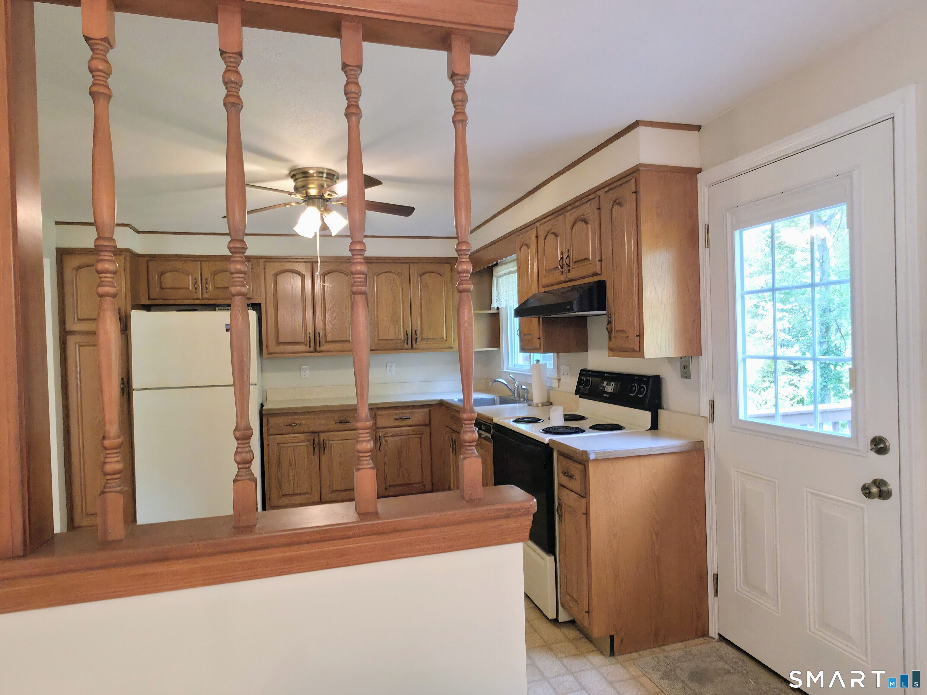 279 Gales Ferry Road Groton, CT 06340 - Photo 10 of 32 Kitchen with access to rear deck