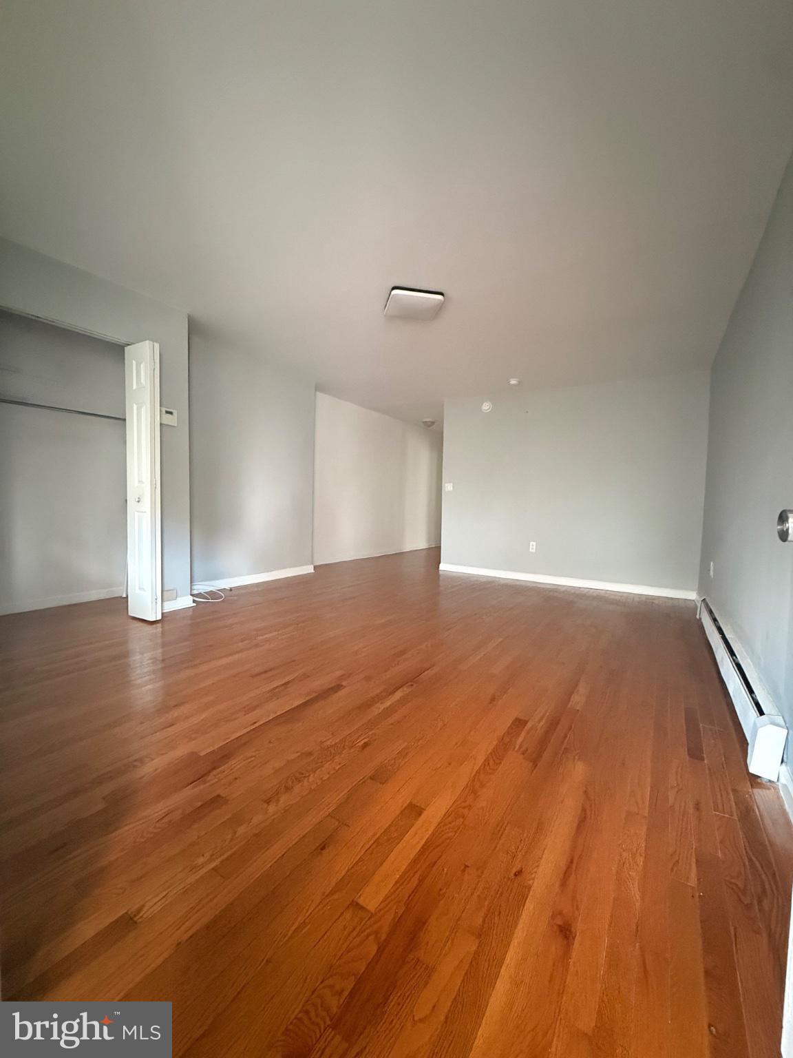822 Wynnewood Road, Unit 1 Philadelphia, PA 19151 - Photo 4 of 16 a view of empty room with wooden floor