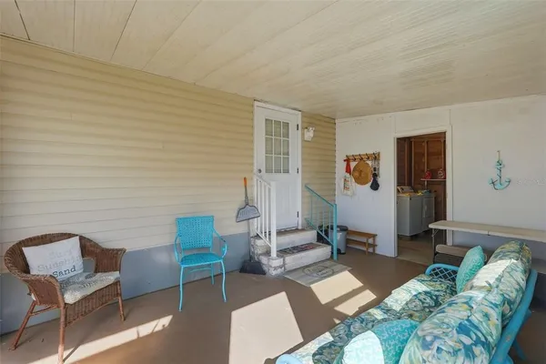 a view of a livingroom with furniture and a couch