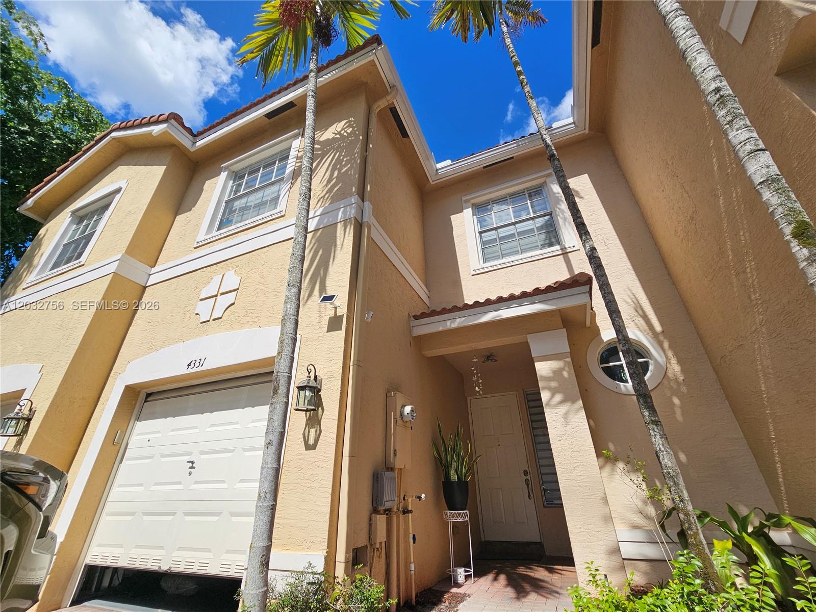 4331 Southwest 124th Way Miramar, FL 33027 - Photo 27 of 40 a view of a building with a door