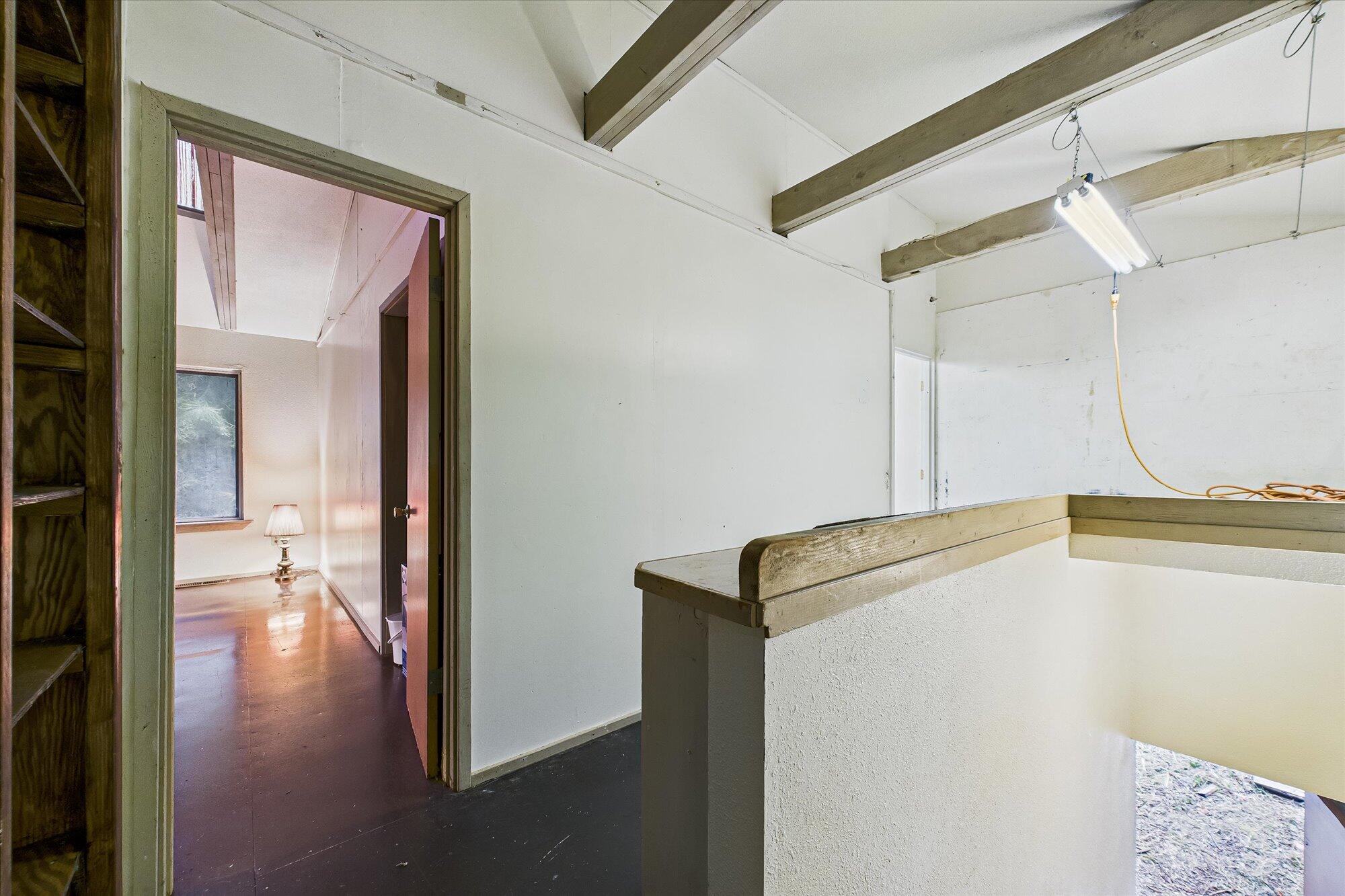 119 Sylva Street Arcata, CA 95521 - Photo 23 of 35 a view of a hallway with wooden floor