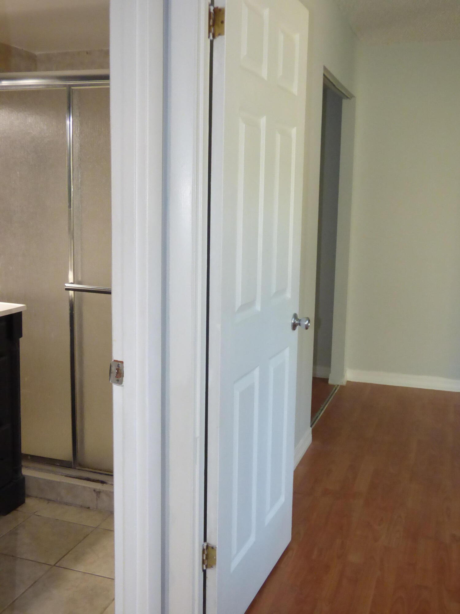 132 South Cypress Road, Unit 514 Pompano Beach, FL 33060 - Photo 11 of 48 a view of a hallway with a hallway