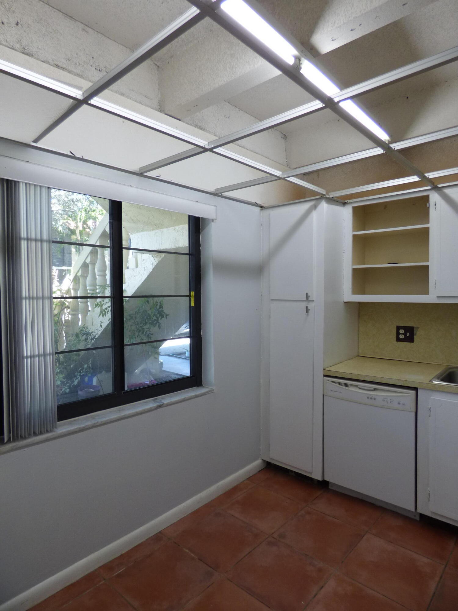132 South Cypress Road, Unit 514 Pompano Beach, FL 33060 - Photo 14 of 48 a view of an empty room with a window