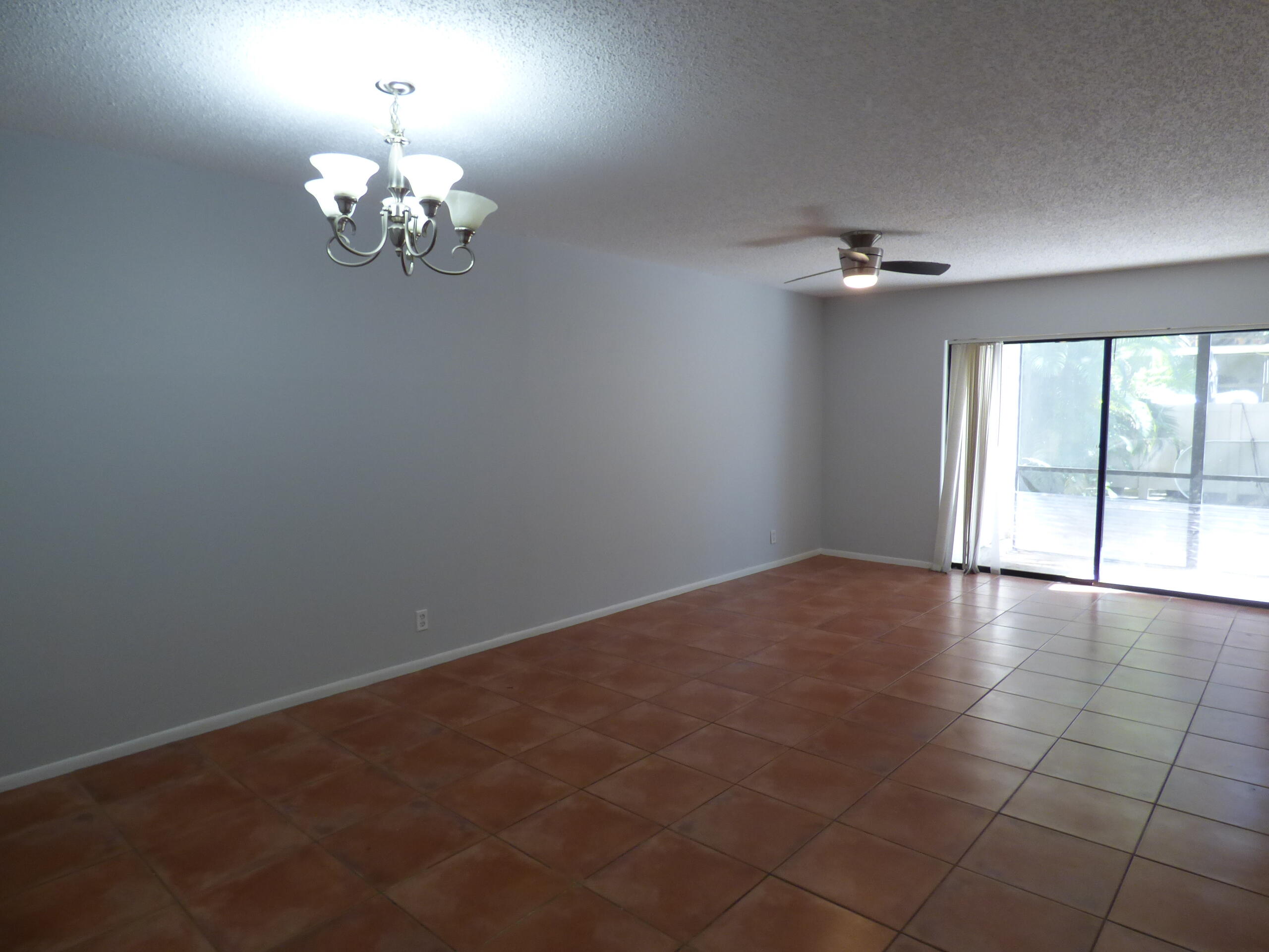 132 South Cypress Road, Unit 514 Pompano Beach, FL 33060 - Photo 15 of 48 a view of an empty room with a window