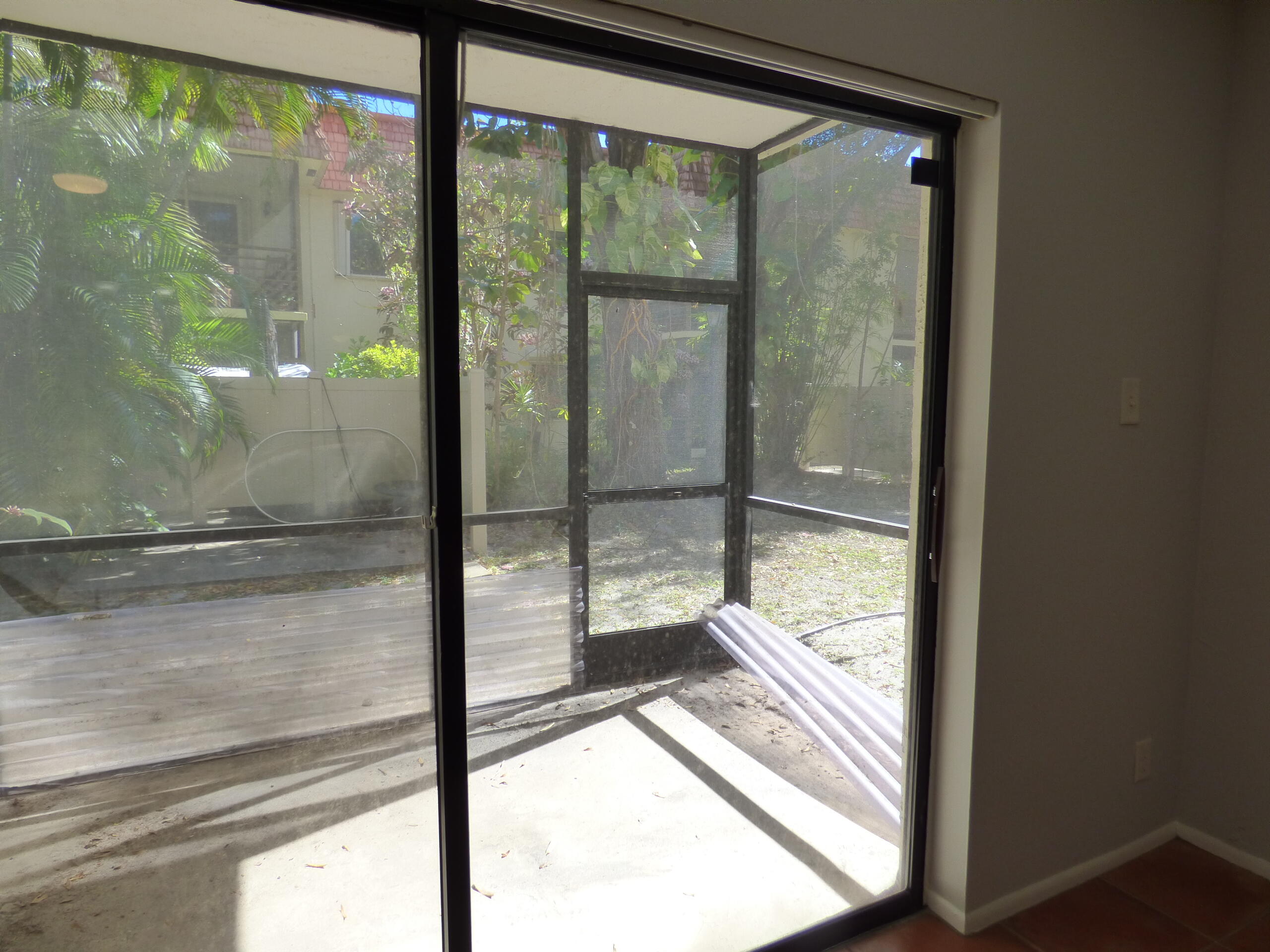 132 South Cypress Road, Unit 514 Pompano Beach, FL 33060 - Photo 18 of 48 a view of a glass door