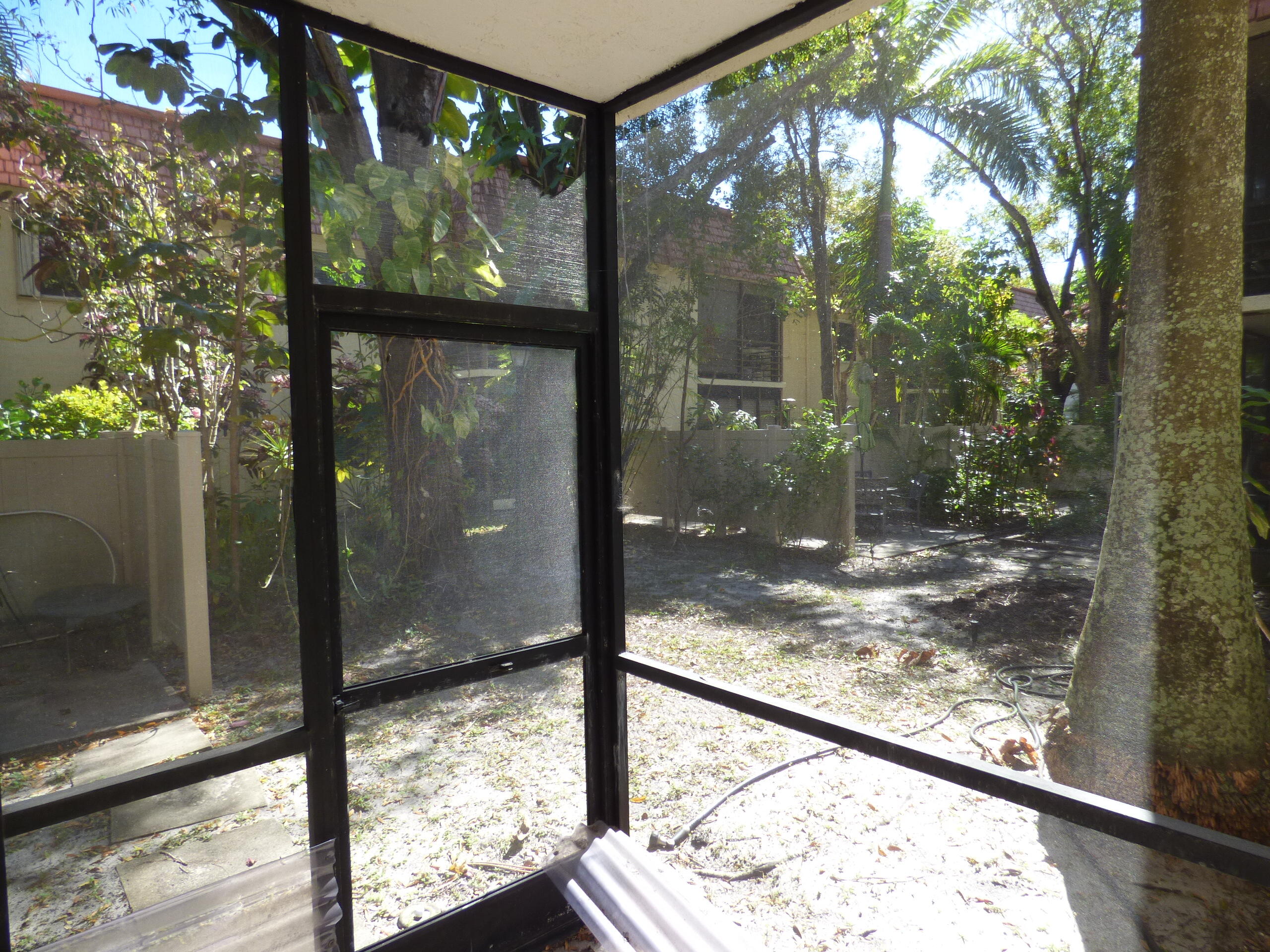 132 South Cypress Road, Unit 514 Pompano Beach, FL 33060 - Photo 20 of 48 a view of a glass door