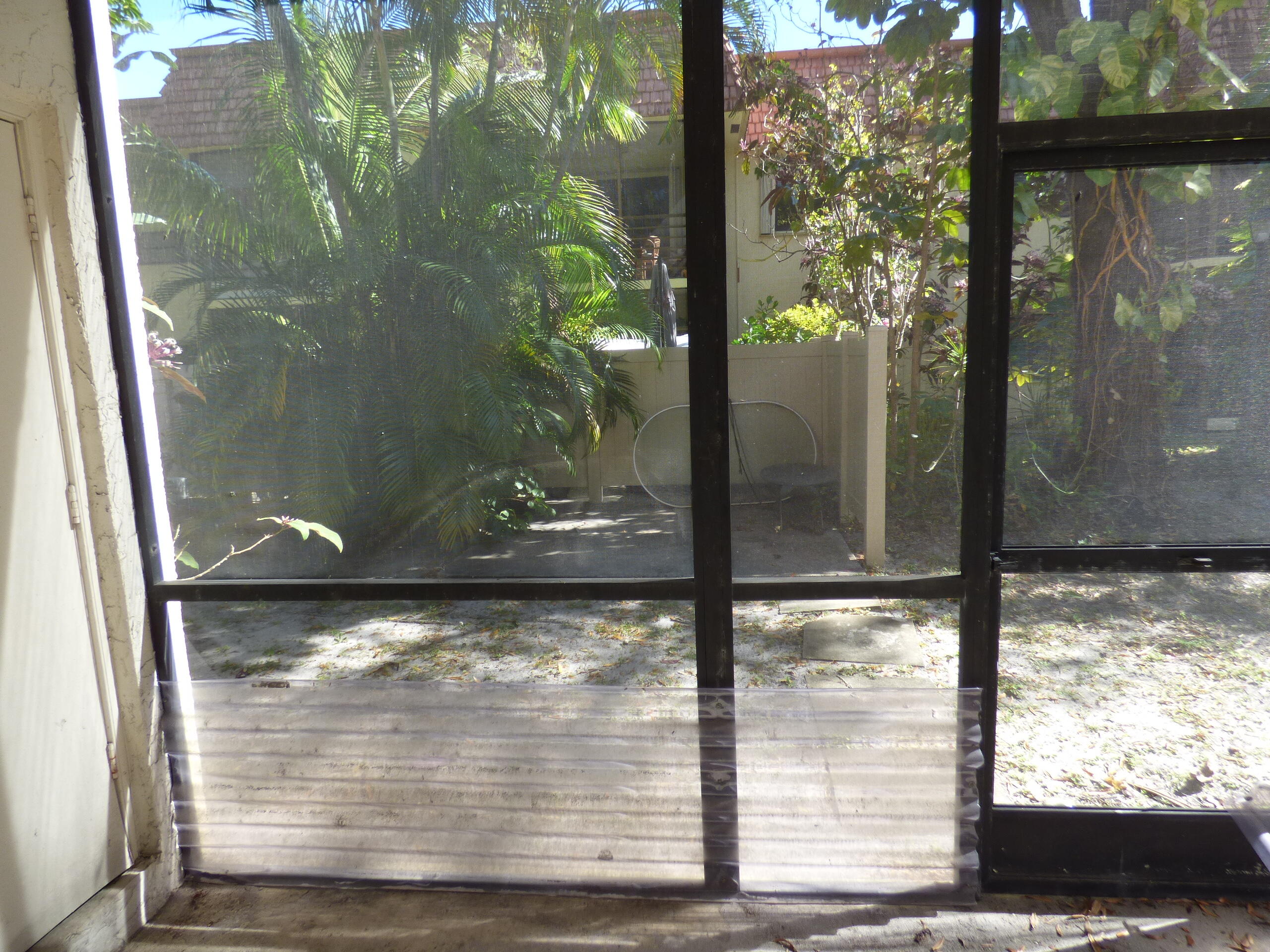 132 South Cypress Road, Unit 514 Pompano Beach, FL 33060 - Photo 21 of 48 a view of a glass door