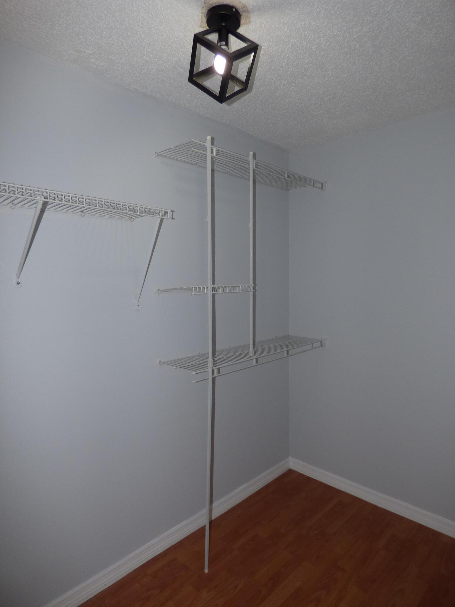 132 South Cypress Road, Unit 514 Pompano Beach, FL 33060 - Photo 29 of 48 a picture of a room with a fan