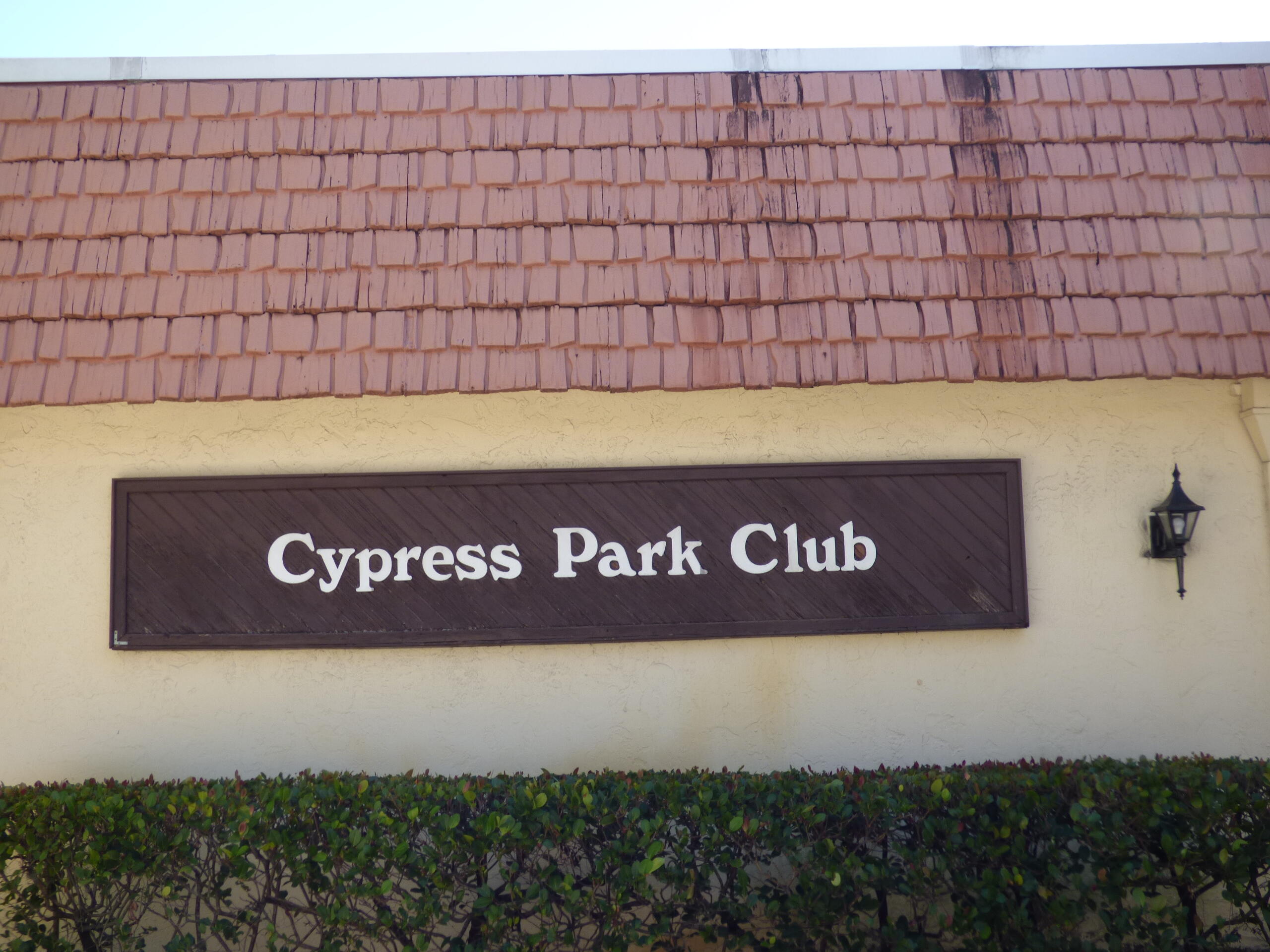 132 South Cypress Road, Unit 514 Pompano Beach, FL 33060 - Photo 33 of 48 a view of outdoor space with a signage