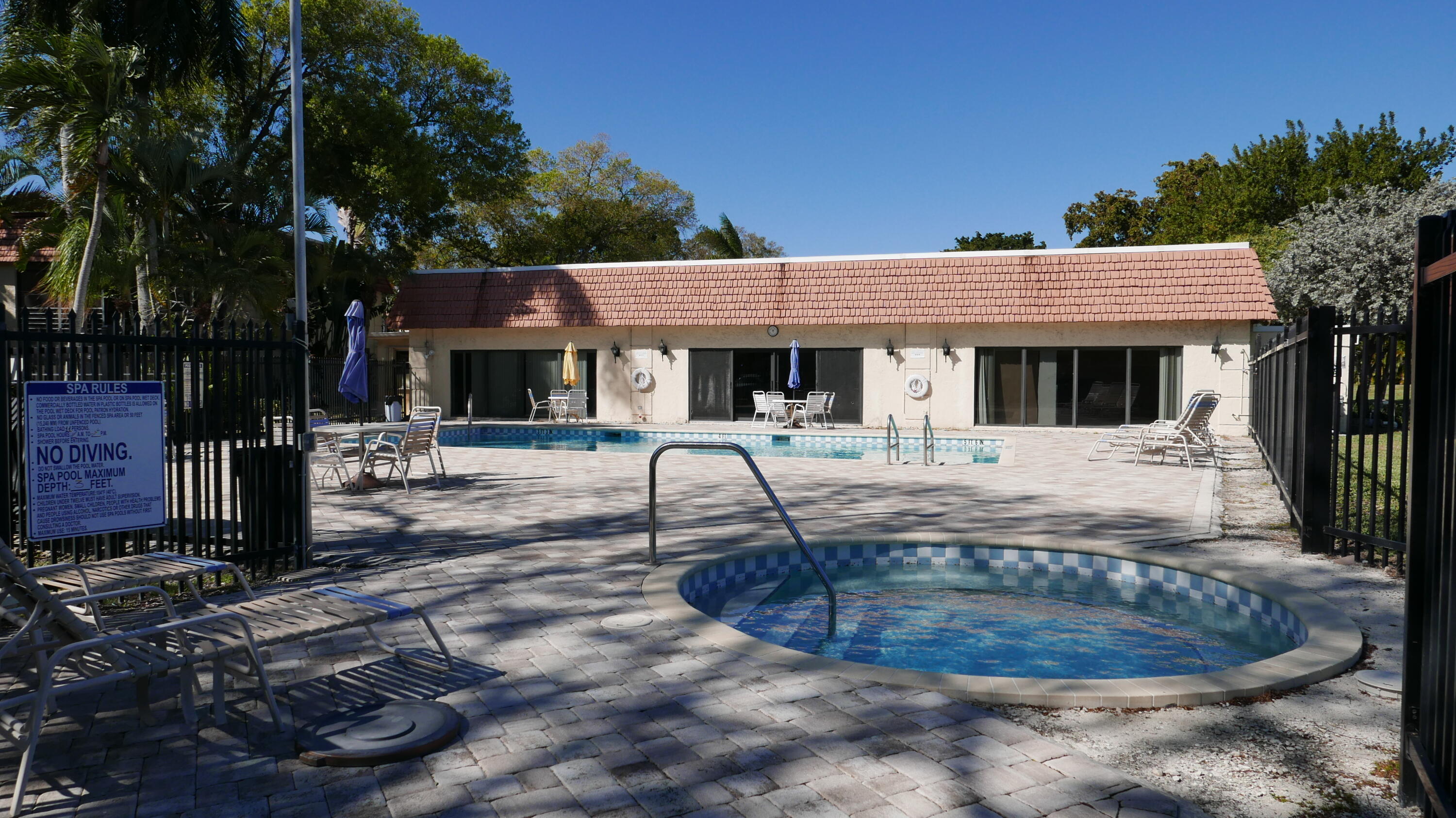 132 South Cypress Road, Unit 514 Pompano Beach, FL 33060 - Photo 36 of 48 a view of a house with backyard