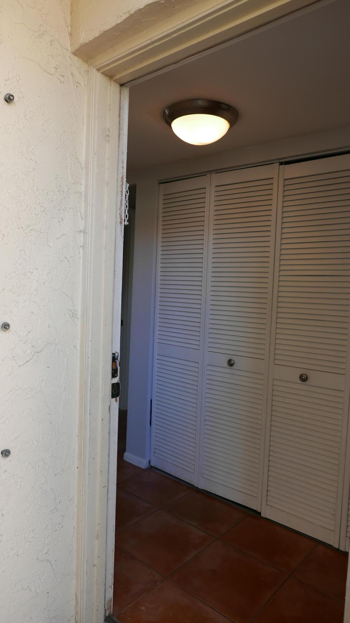 132 South Cypress Road, Unit 514 Pompano Beach, FL 33060 - Photo 5 of 48 a view of wooden door