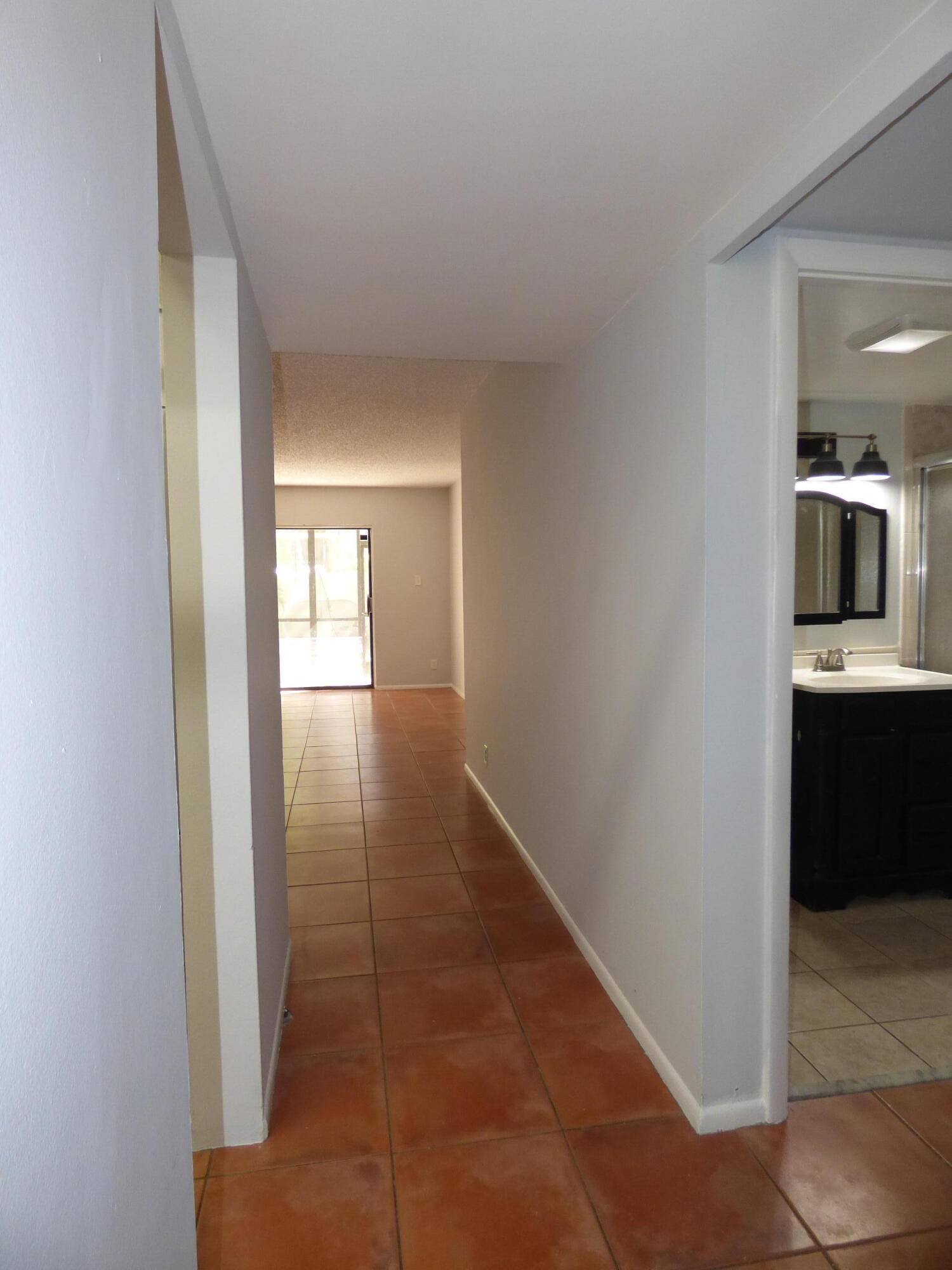 132 South Cypress Road, Unit 514 Pompano Beach, FL 33060 - Photo 6 of 48 a view of hallway with bathroom