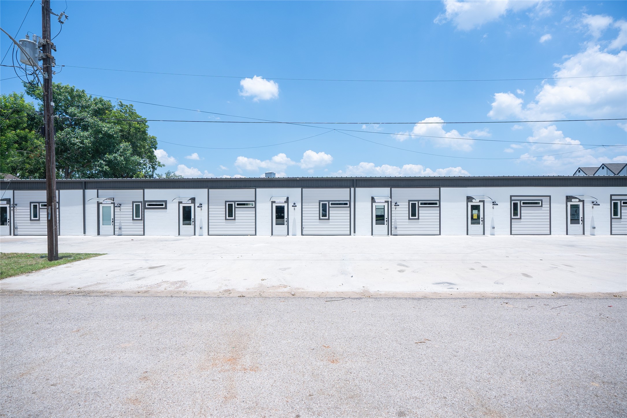 2612 Castle Street, Unit H Waller, TX 77484 - Photo 1 of 11 a view of house with a outdoor space