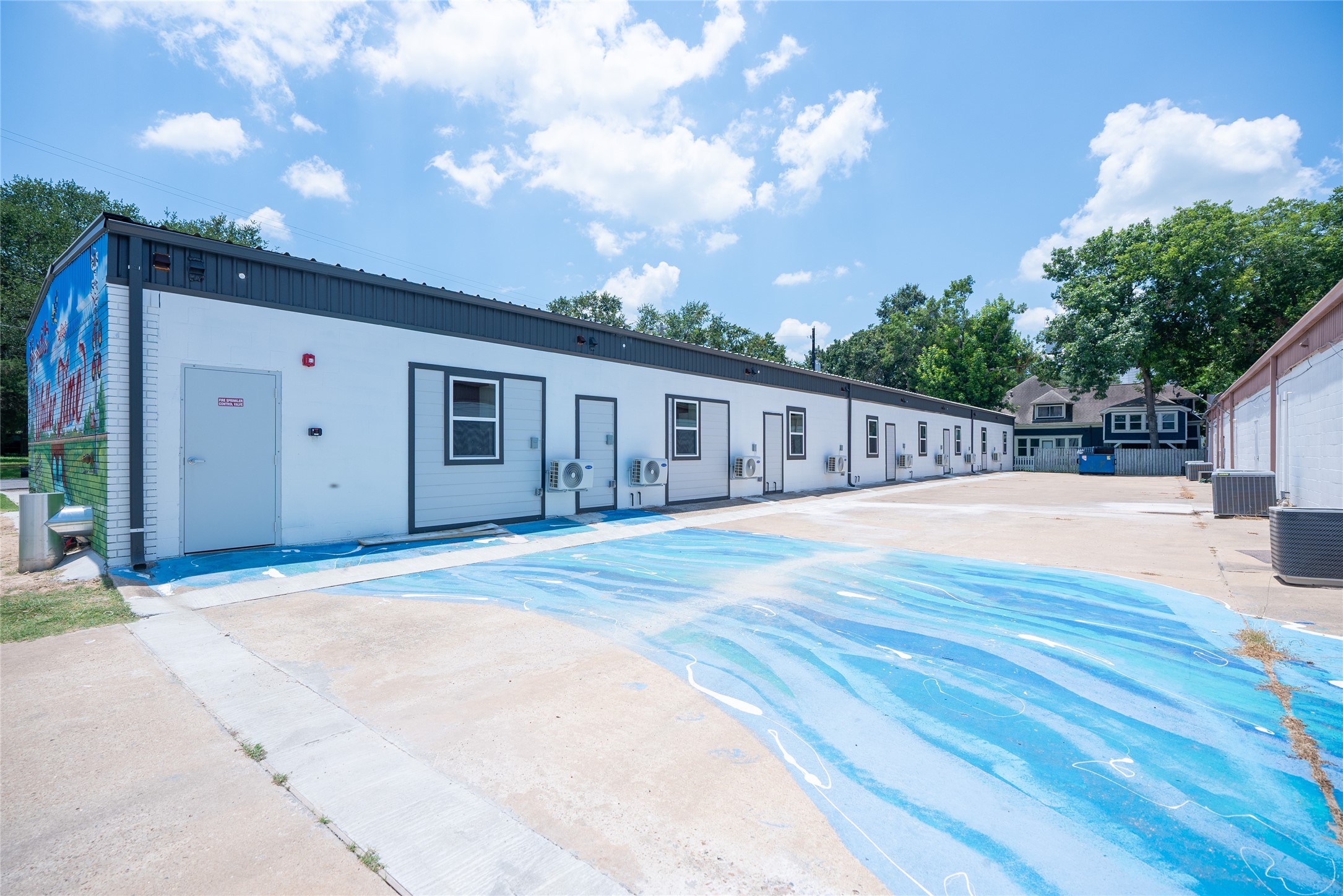 2612 Castle Street, Unit H Waller, TX 77484 - Photo 9 of 11 a view of swimming pool with a patio