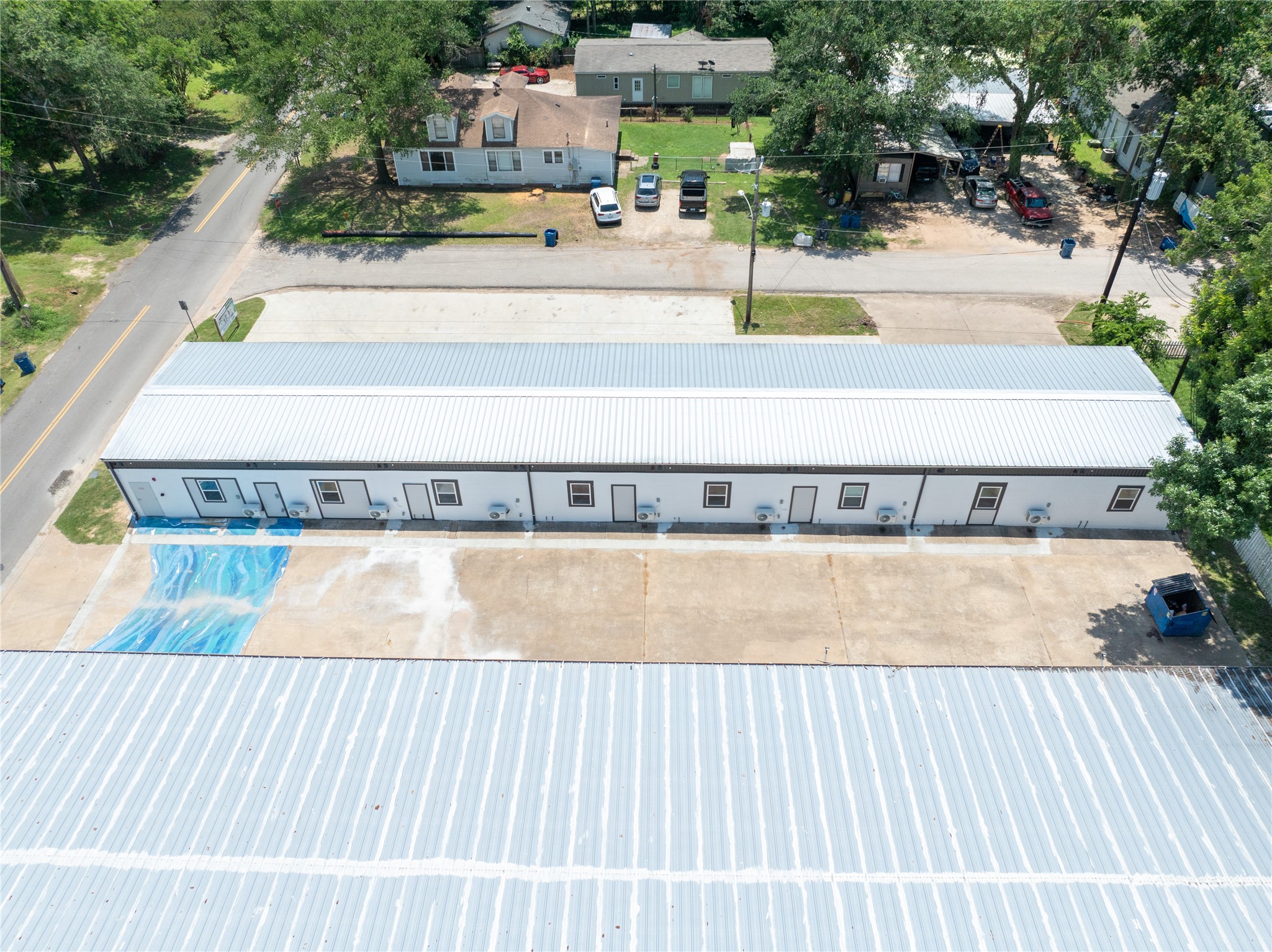 2612 Castle Street, Unit H Waller, TX 77484 - Photo 10 of 11 a view of a swimming pool with a patio