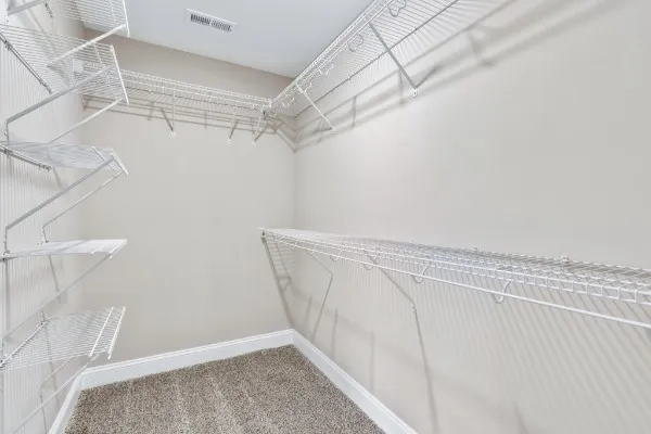 a view of a room with racks on the wall