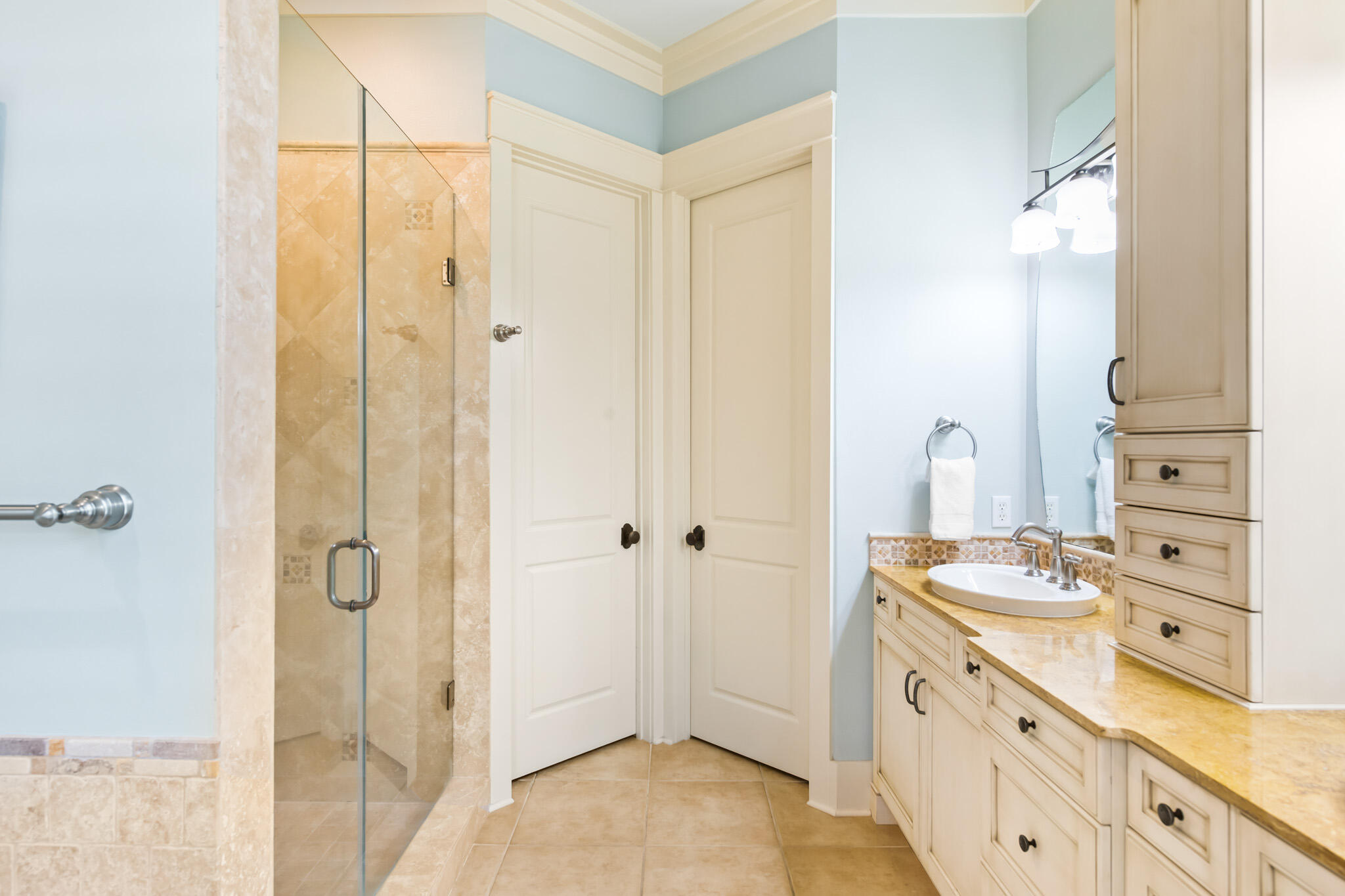 70 Pine Crest Circle Inlet Beach, FL 32461 - Photo 17 of 43 a bathroom with a granite countertop sink a mirror and a shower