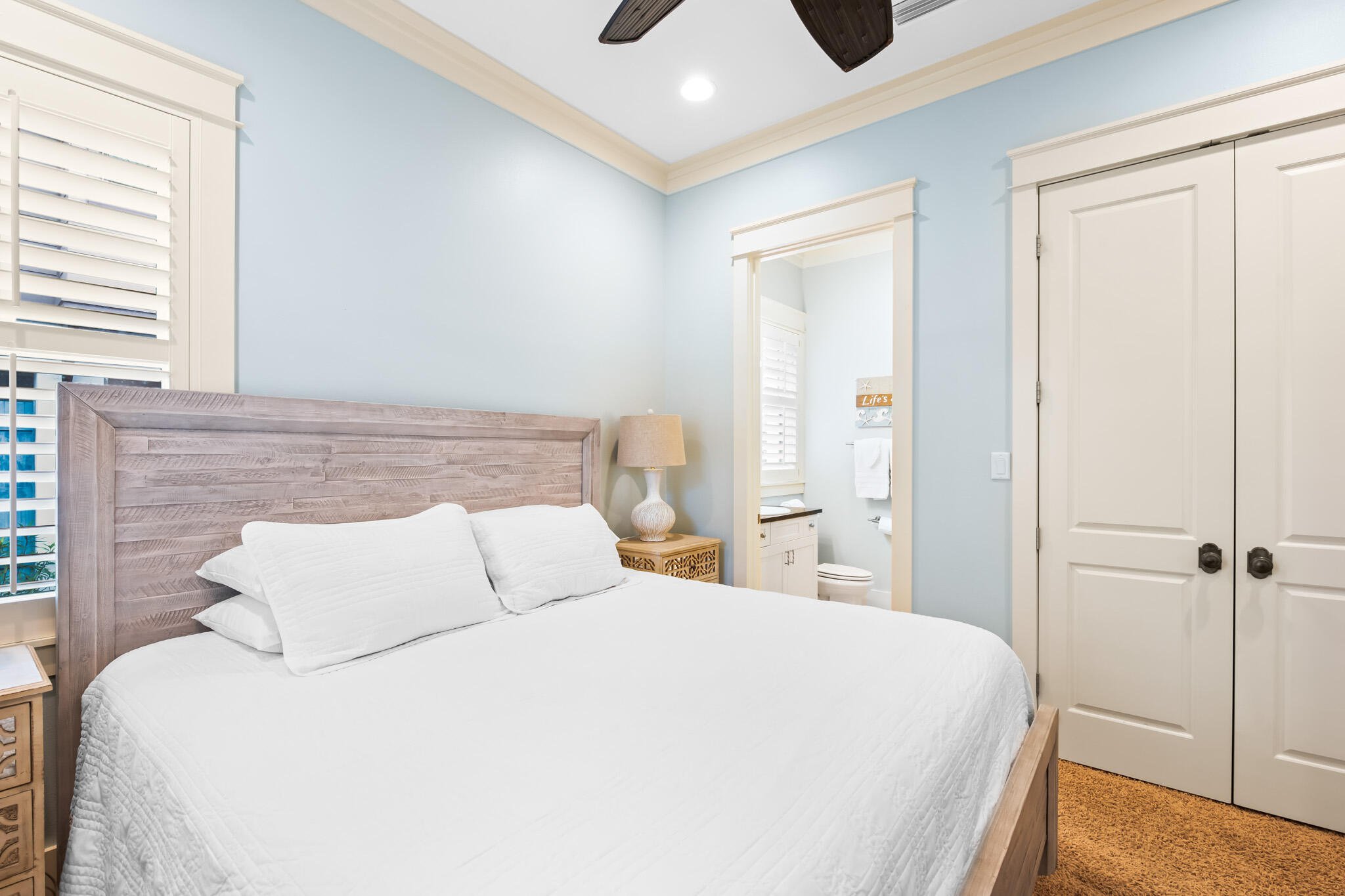 70 Pine Crest Circle Inlet Beach, FL 32461 - Photo 25 of 43 a bedroom with a bed and a window