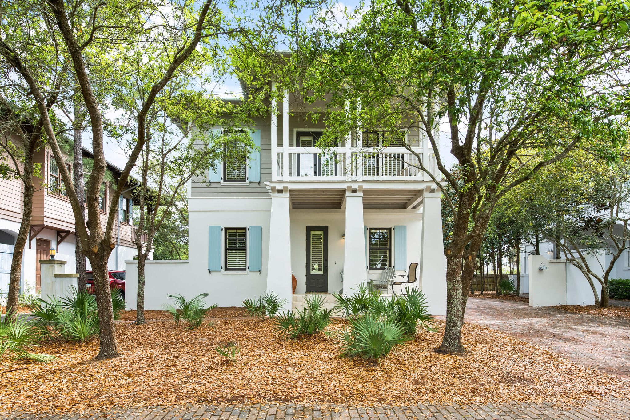 70 Pine Crest Circle Inlet Beach, FL 32461 - Photo 39 of 43 a front view of a house with a garden