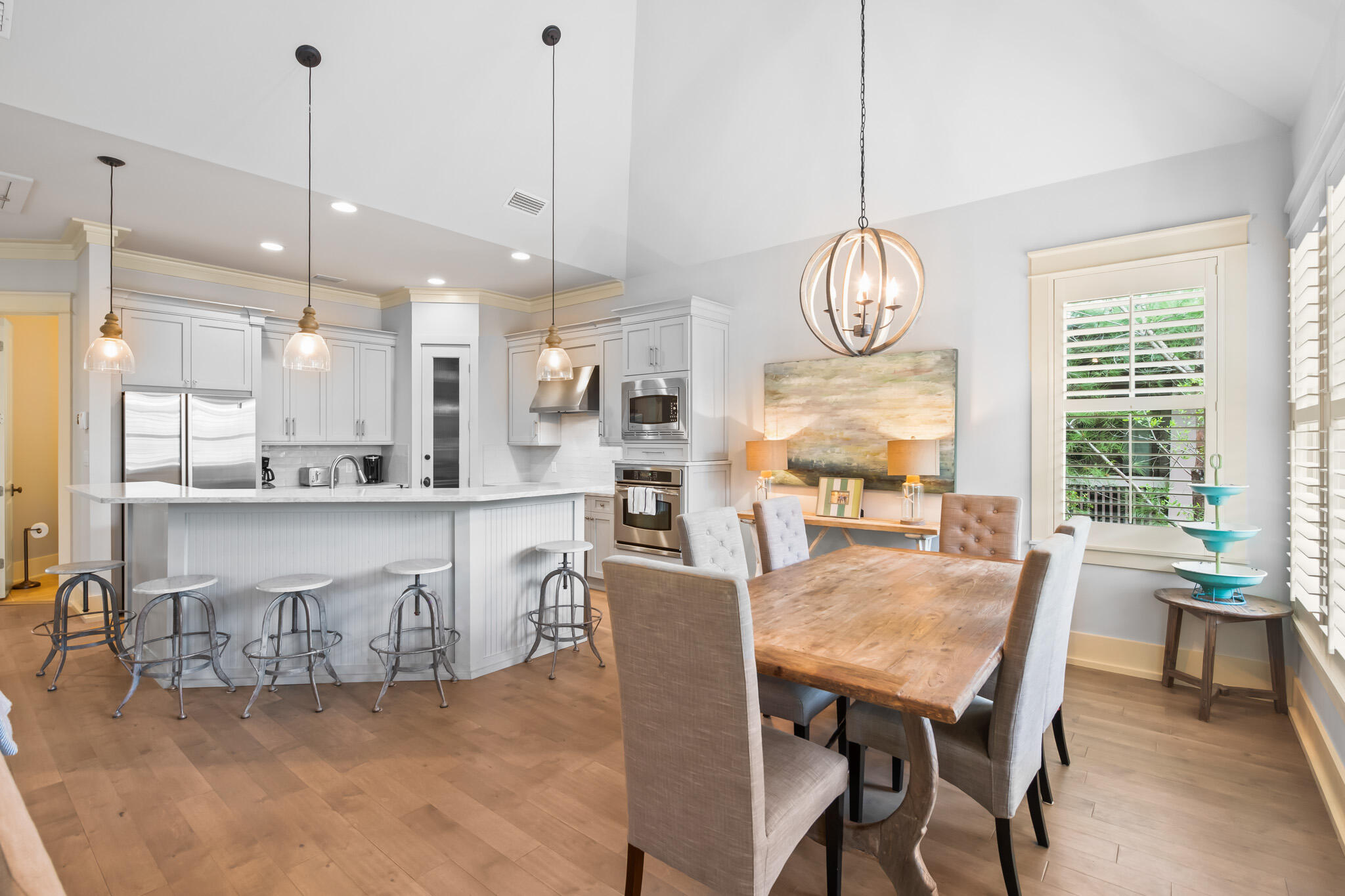 70 Pine Crest Circle Inlet Beach, FL 32461 - Photo 4 of 43 a large kitchen with a table and chairs