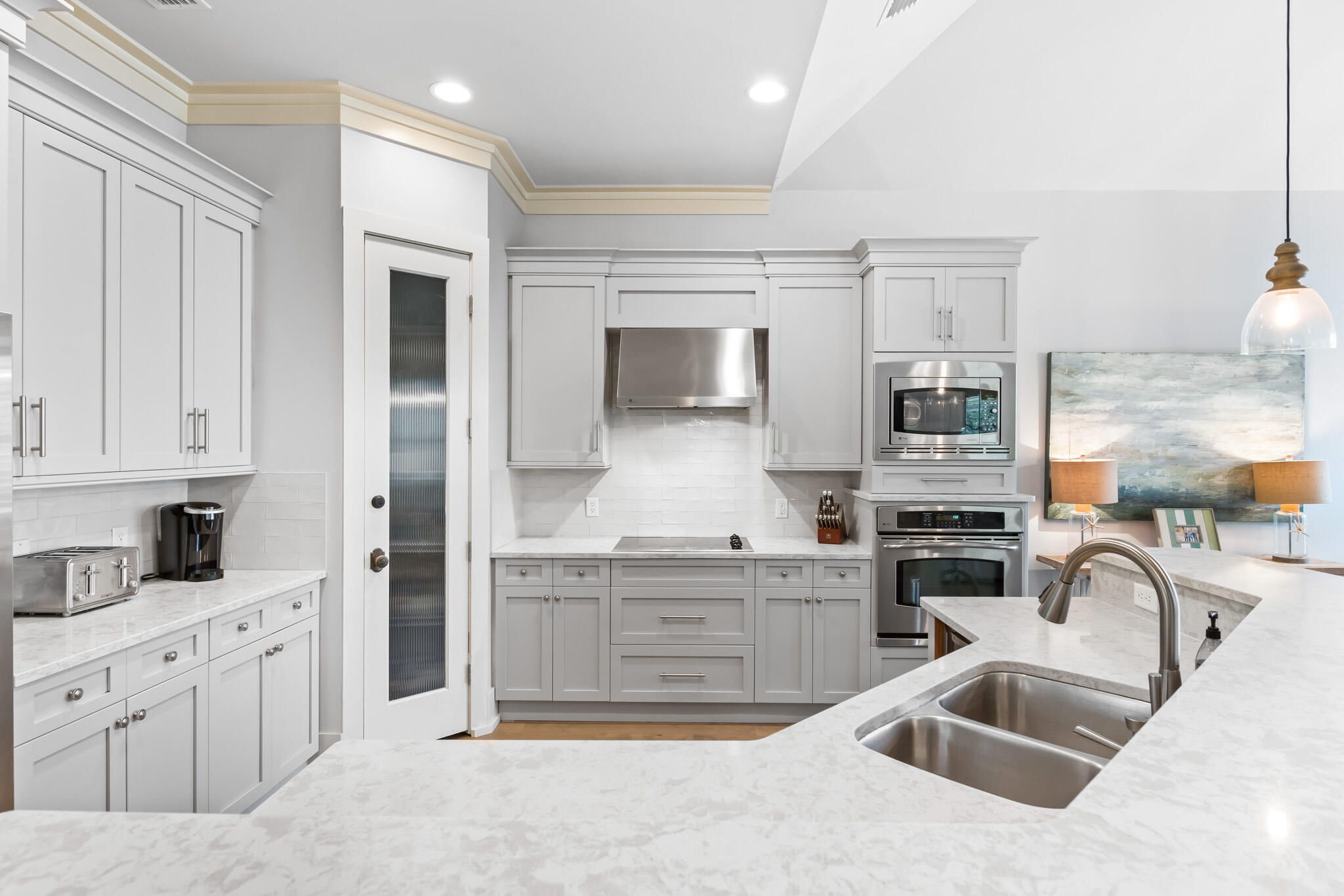 70 Pine Crest Circle Inlet Beach, FL 32461 - Photo 6 of 43 a kitchen with stainless steel appliances granite countertop a sink stove and cabinets
