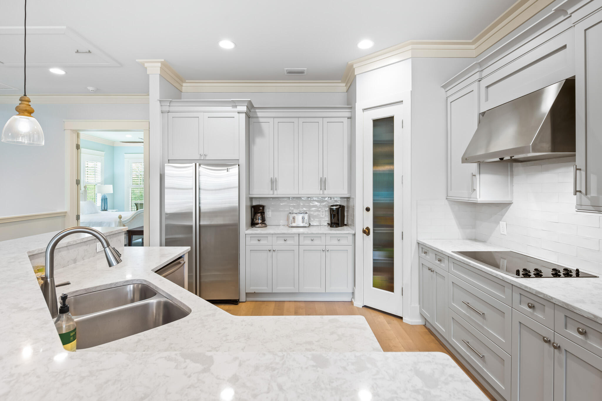 70 Pine Crest Circle Inlet Beach, FL 32461 - Photo 8 of 43 a kitchen with a refrigerator and a sink