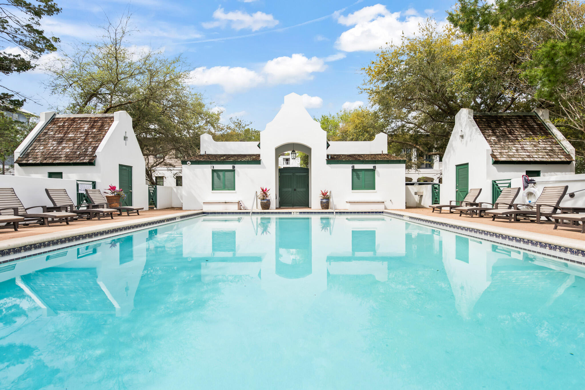 70 Pine Crest Circle Inlet Beach, FL 32461 - Photo 10 of 43 a view of a house with pool and chairs
