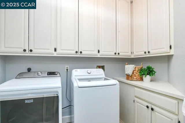 a spacious bedroom with a bed a window and wooden floor