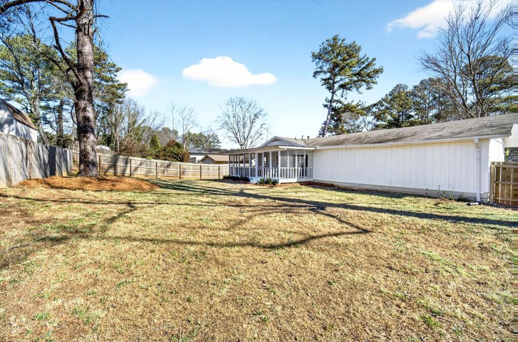 2545 Ridgecrest Drive Northwest Kennesaw, GA 30152 - Photo 20 of 20 a house view with swimming pool in front of house