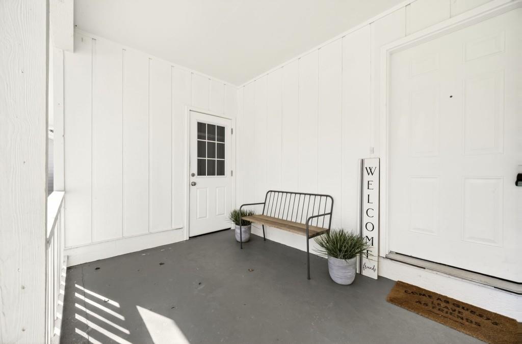 2545 Ridgecrest Drive Northwest Kennesaw, GA 30152 - Photo 2 of 20 a living room with furniture and a potted plant