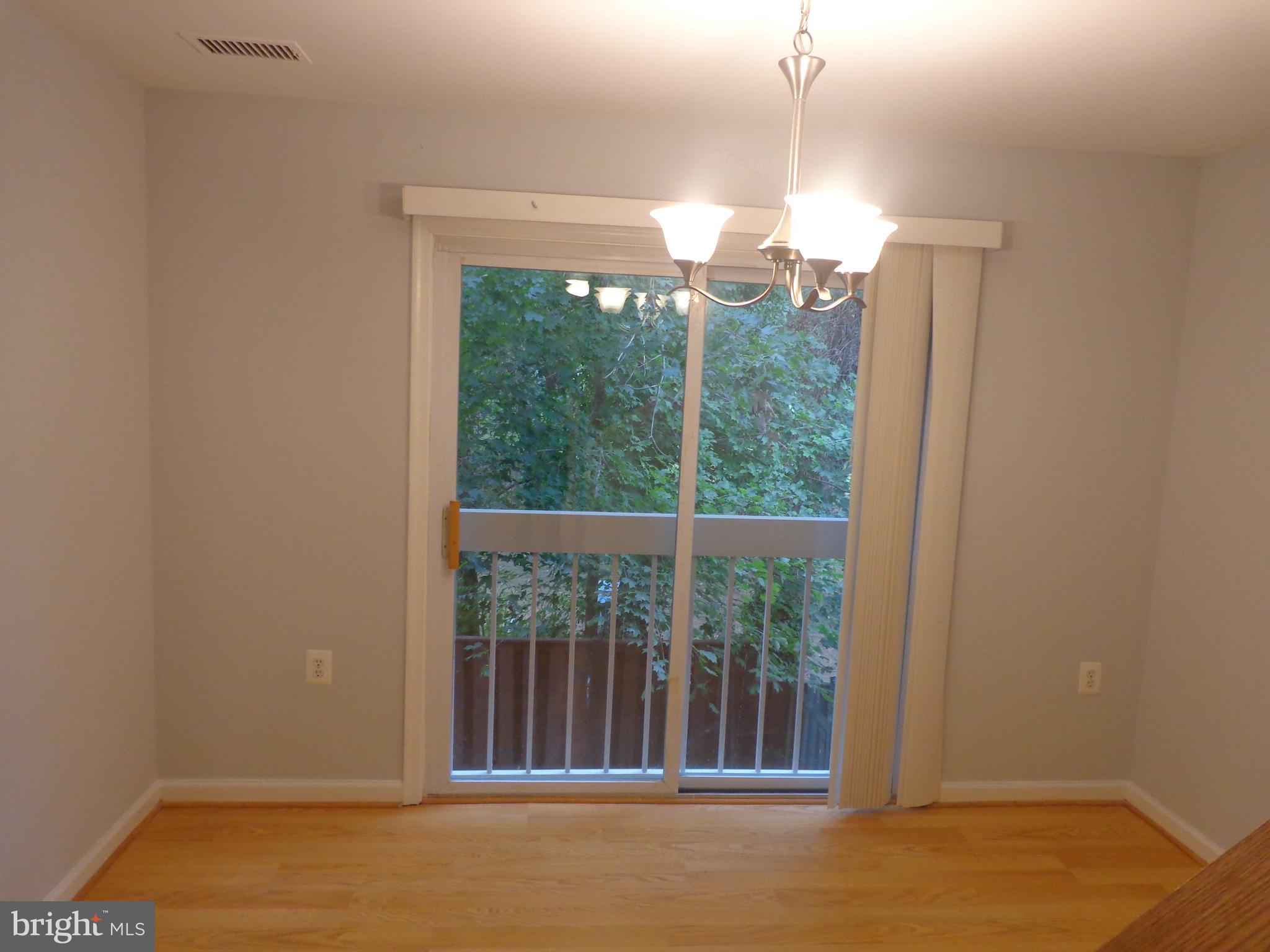 5565 Peppercorn Drive Burke, VA 22015 - Photo 20 of 41 a view of a room with window swimming pool and outdoor space