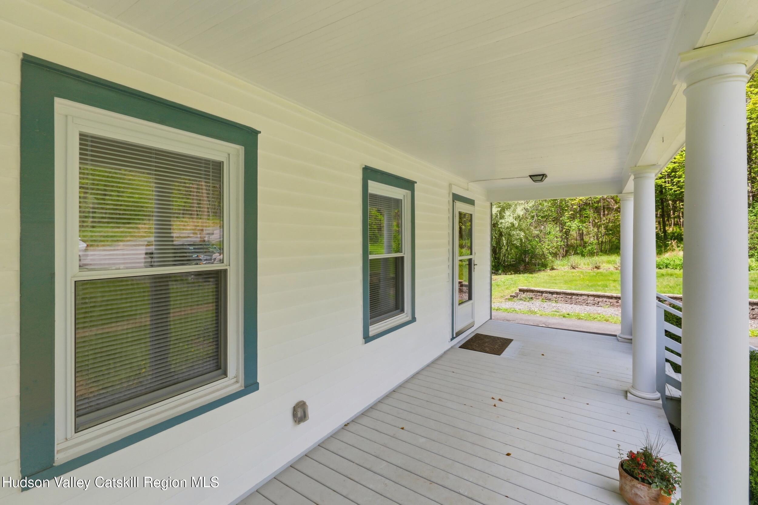 294 Kyserike Road Accord, NY 12404 - Photo 6 of 46 a view of an empty room with glass door and balcony
