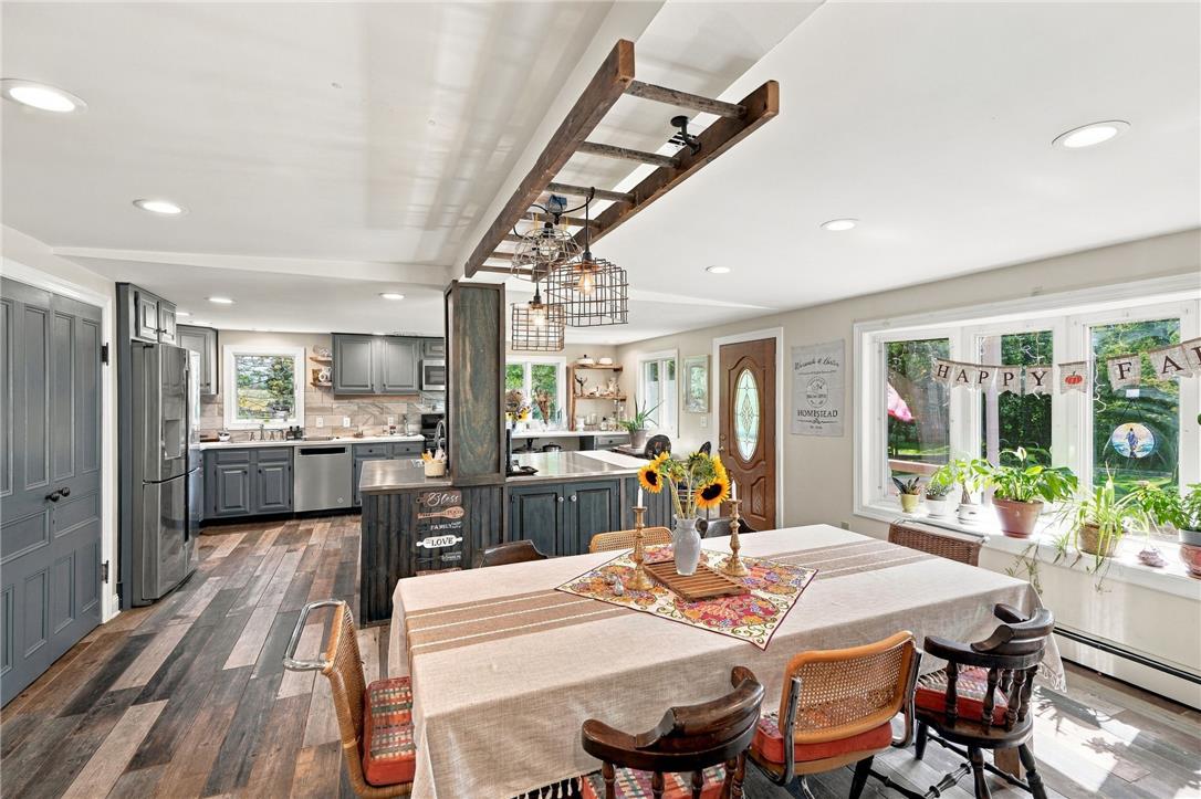 1255 Clearview Road Coplay, PA 18037 - Photo 17 of 54 Gleaming hardwood floors and a spacious kitchen island anchor this open-concept dining space.