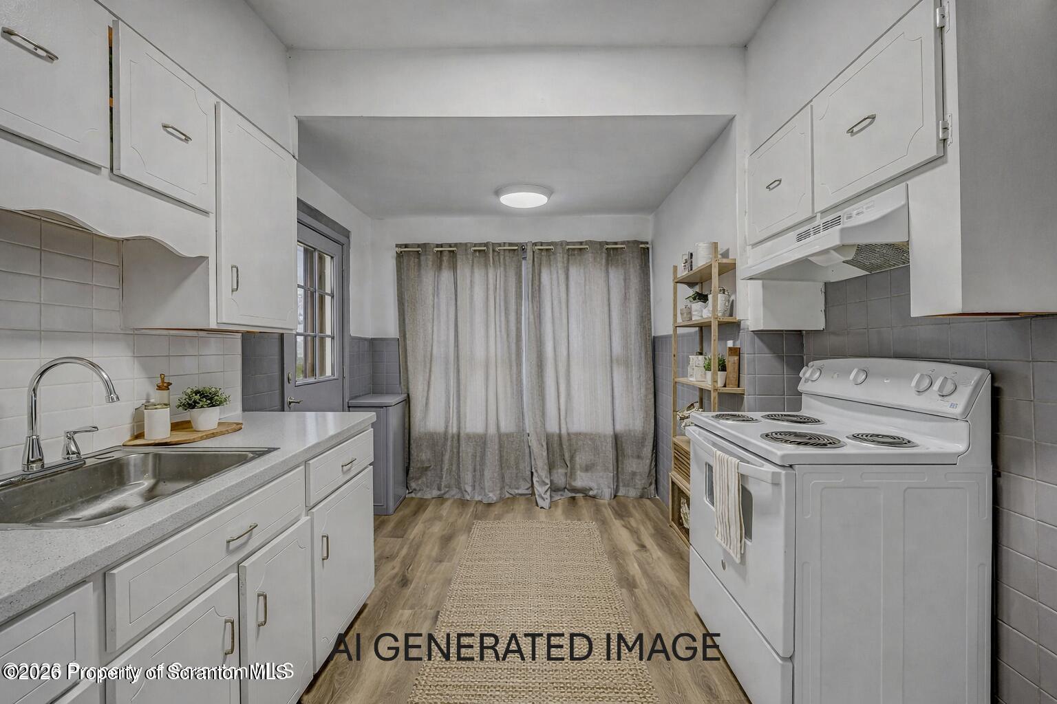 905 Albright Avenue Scranton, PA 18508 - Photo 16 of 56 a kitchen that has a sink and a stove in it