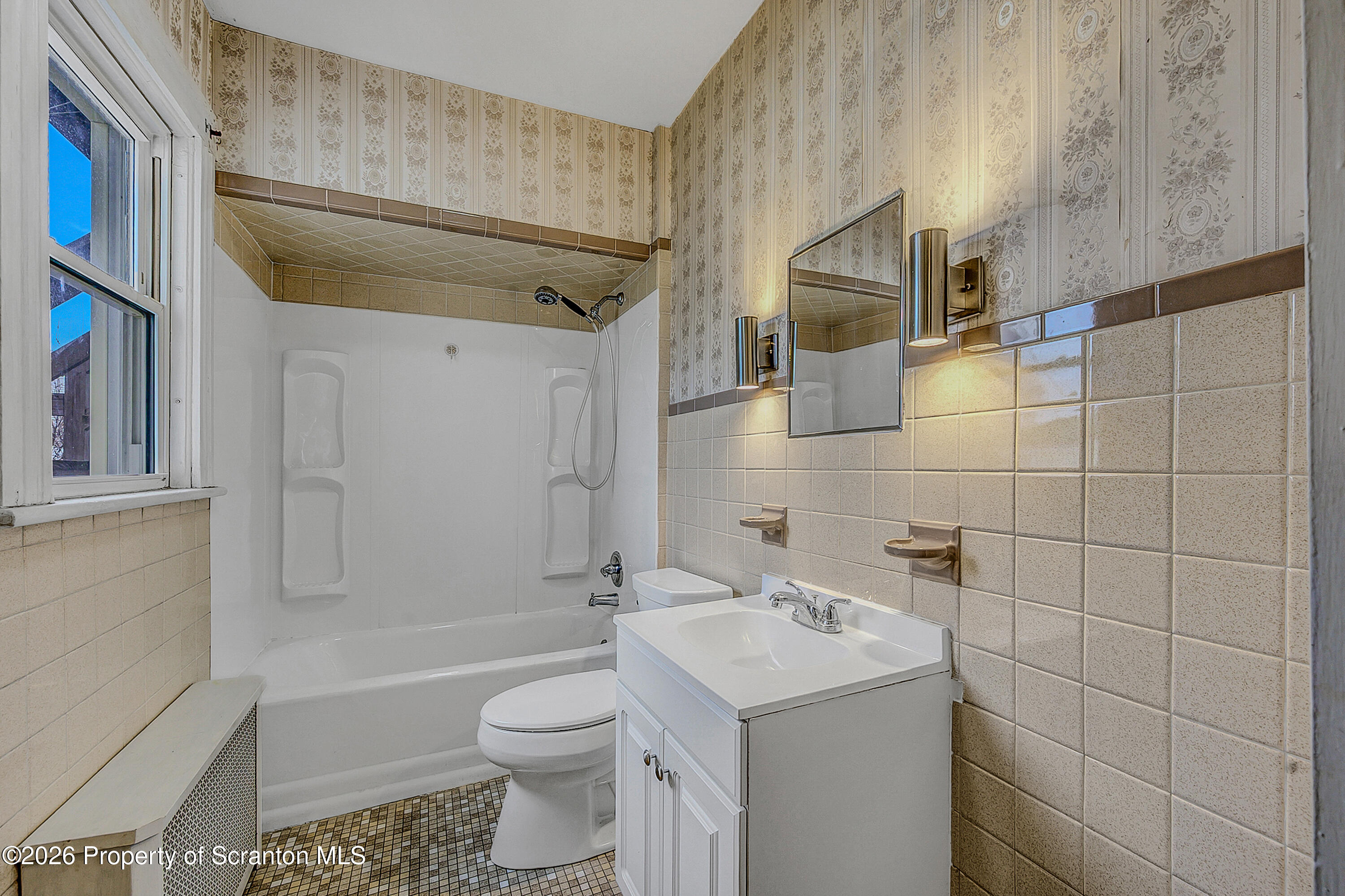 905 Albright Avenue Scranton, PA 18508 - Photo 17 of 56 a bathroom with a sink toilet and shower