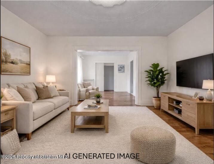 905 Albright Avenue Scranton, PA 18508 - Photo 28 of 56 a living room with furniture a flat screen tv and a potted plant
