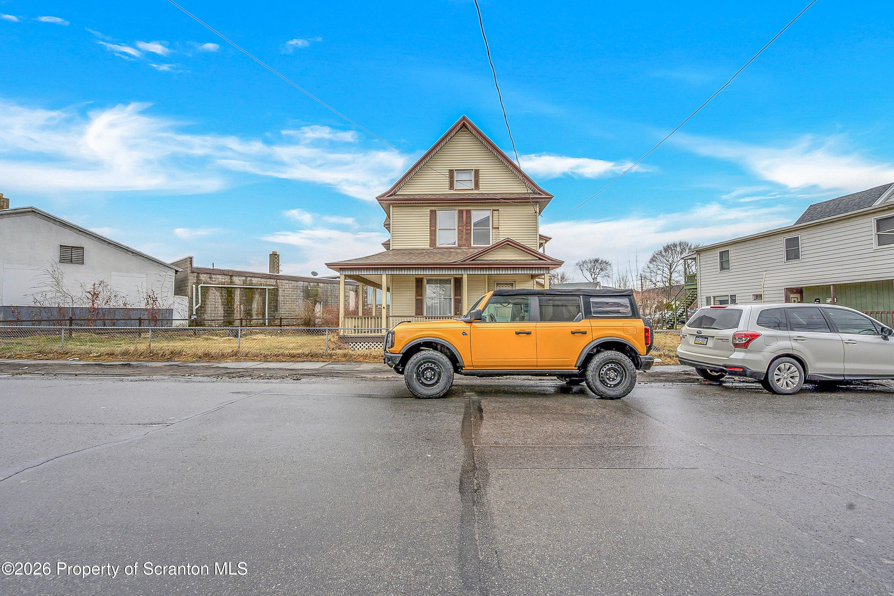 905 Albright Avenue Scranton, PA 18508 - Photo 3 of 56 a view of a car parked in front of a house