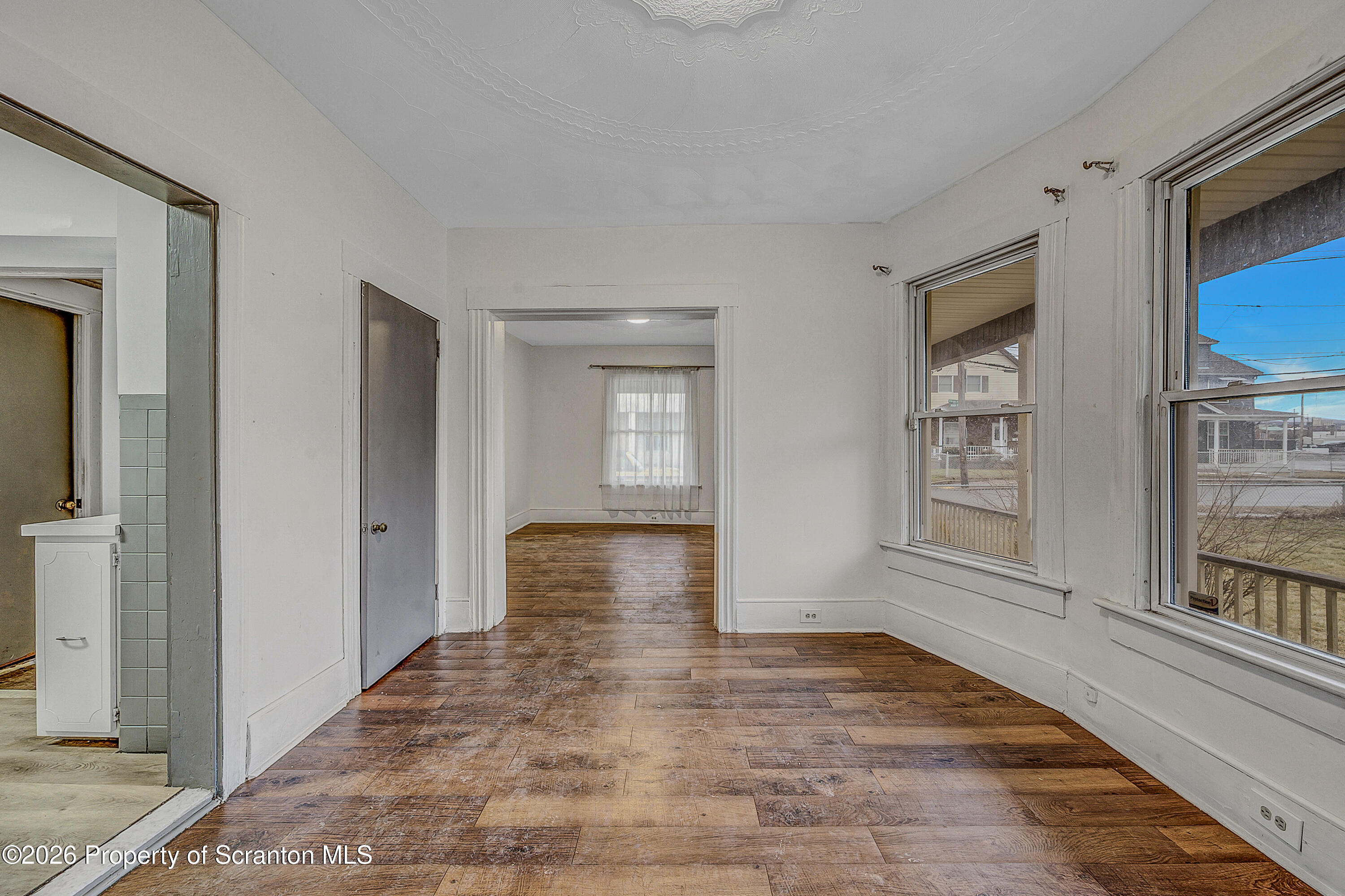 905 Albright Avenue Scranton, PA 18508 - Photo 34 of 56 a view of an empty room with window and wooden floor