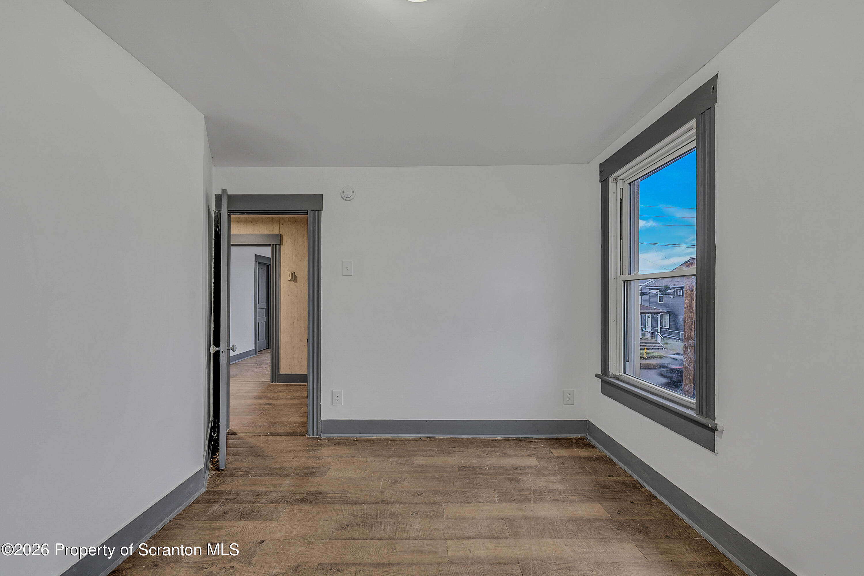 905 Albright Avenue Scranton, PA 18508 - Photo 35 of 56 a view of an empty room with window and stairs